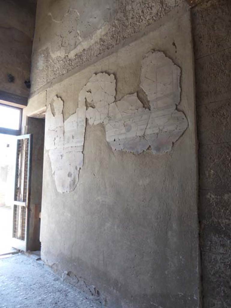 III.11, Herculaneum, June 2017, Room 1, painted decoration on south wall of entrance corridor, looking east. Photo courtesy of Michael Binns.